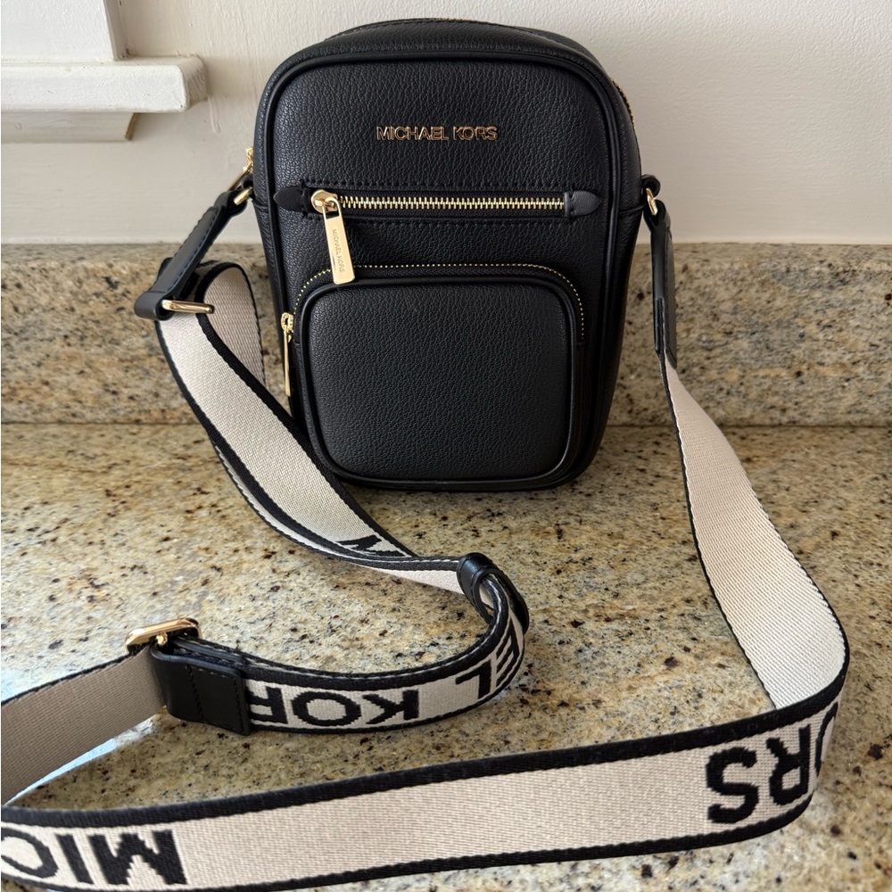 Michael Kors Black Belt Bag with Adjustable Straps and Sporty Design